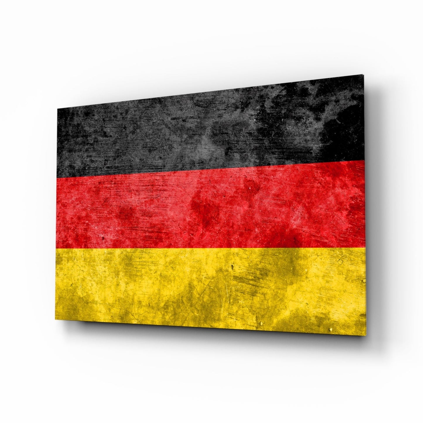 German flag glass wall art displayed at an angle, showing black, red, and yellow horizontal stripes with textured surface.