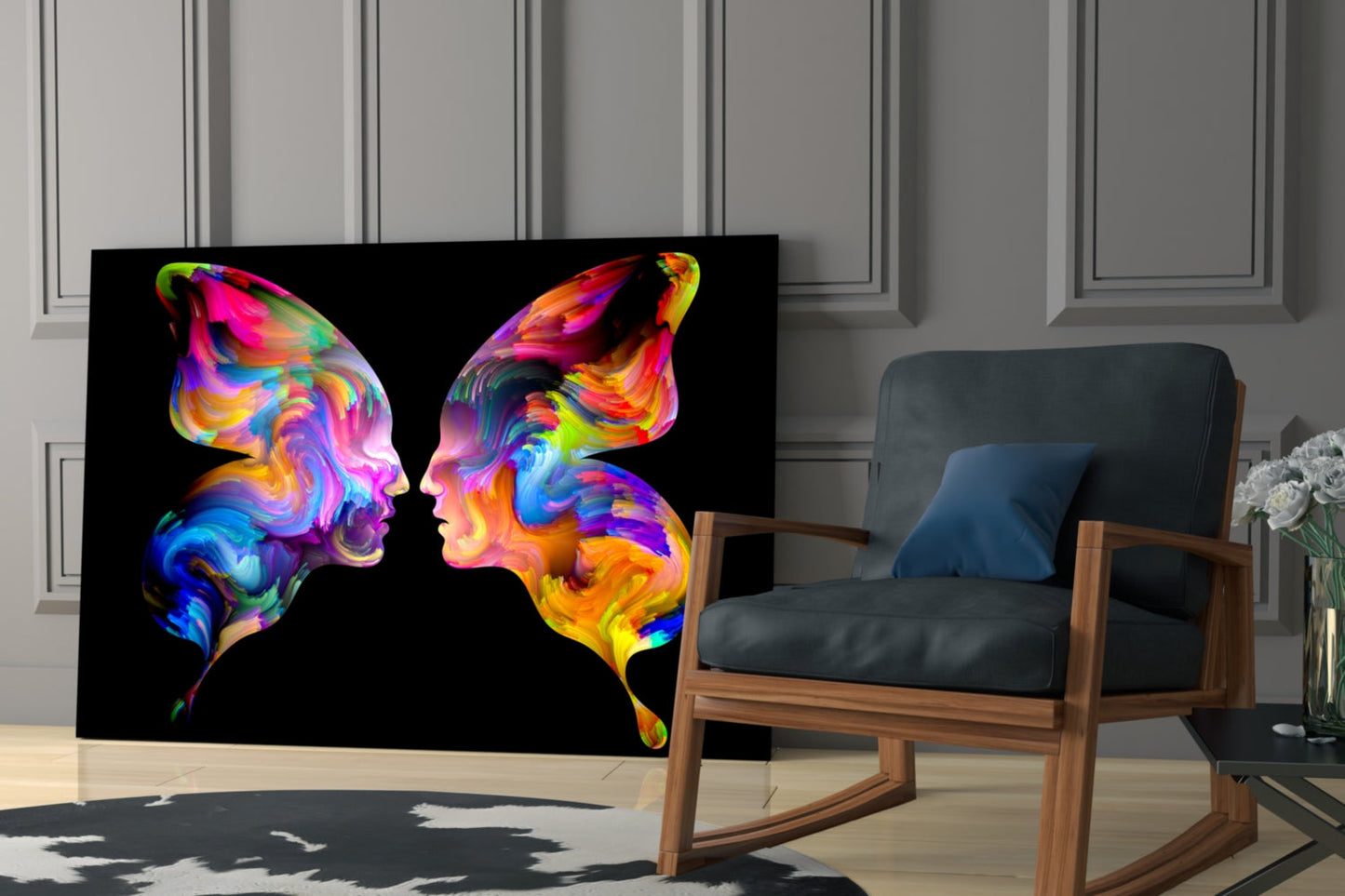 Colorful glass wall art displaying two vibrant, mirrored profile silhouettes against black background in modern living room setting.