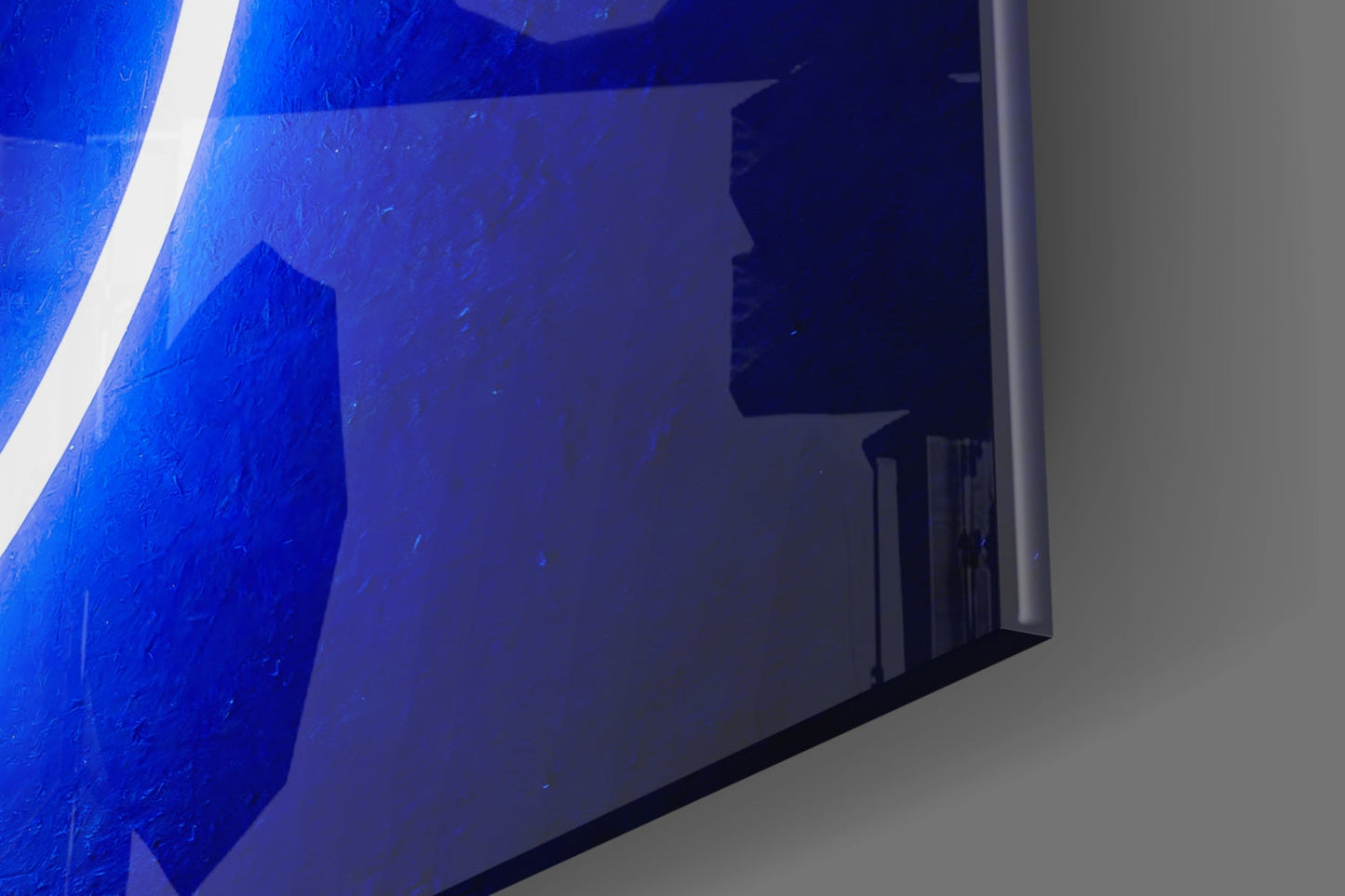 Close-up angled view of blue glass wall art with white vertical neon line accent and dark interior shadow detail.