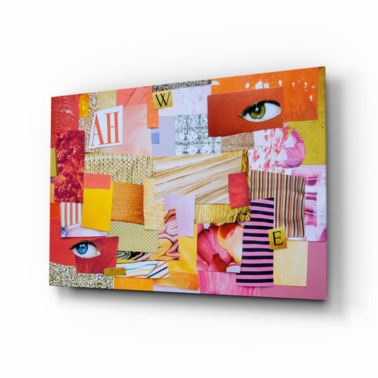 Angled front view of colorful patchwork glass wall art featuring vibrant patches of pink, orange, yellow, textures, and two eye cutouts with letters A, H, W, B visible.