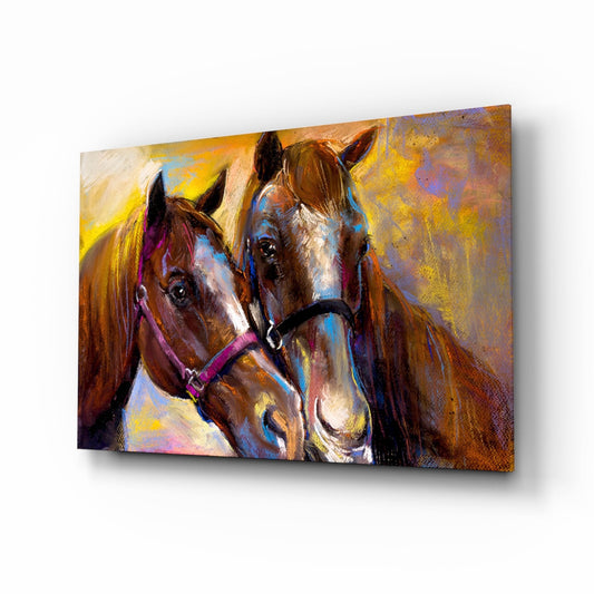 Two brown horses with colorful blue and purple bridles shown in a vibrant golden-toned painted glass art panel displayed at an angle.