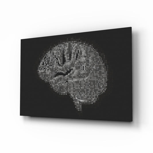 Three-dimensional angled view of black glass panel displaying white binary code forming a brain silhouette against dark background.