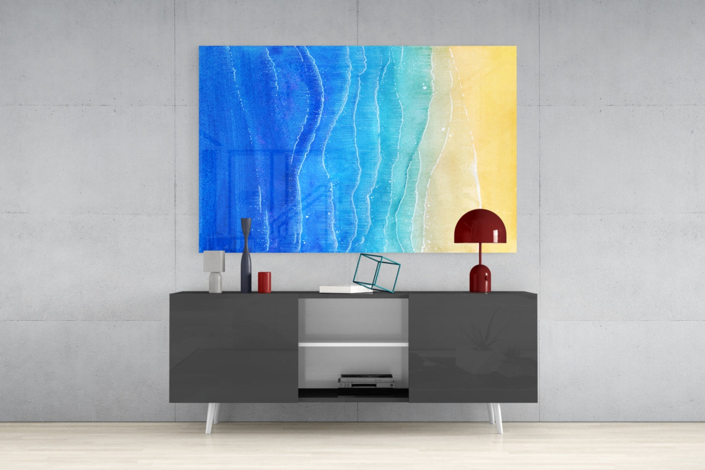 Sea Sand Glass Wall Art displaying gradient waves from deep blue to yellow, hung above a dark gray media console in a modern interior setting.