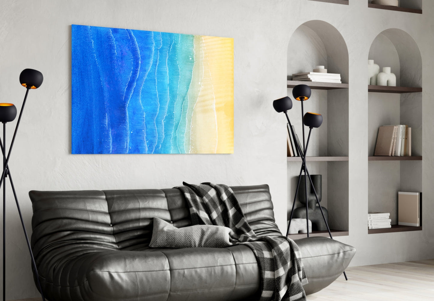 Sea Sand Glass Wall Art with blue-to-yellow gradient hung above black leather sofa in modern living room.