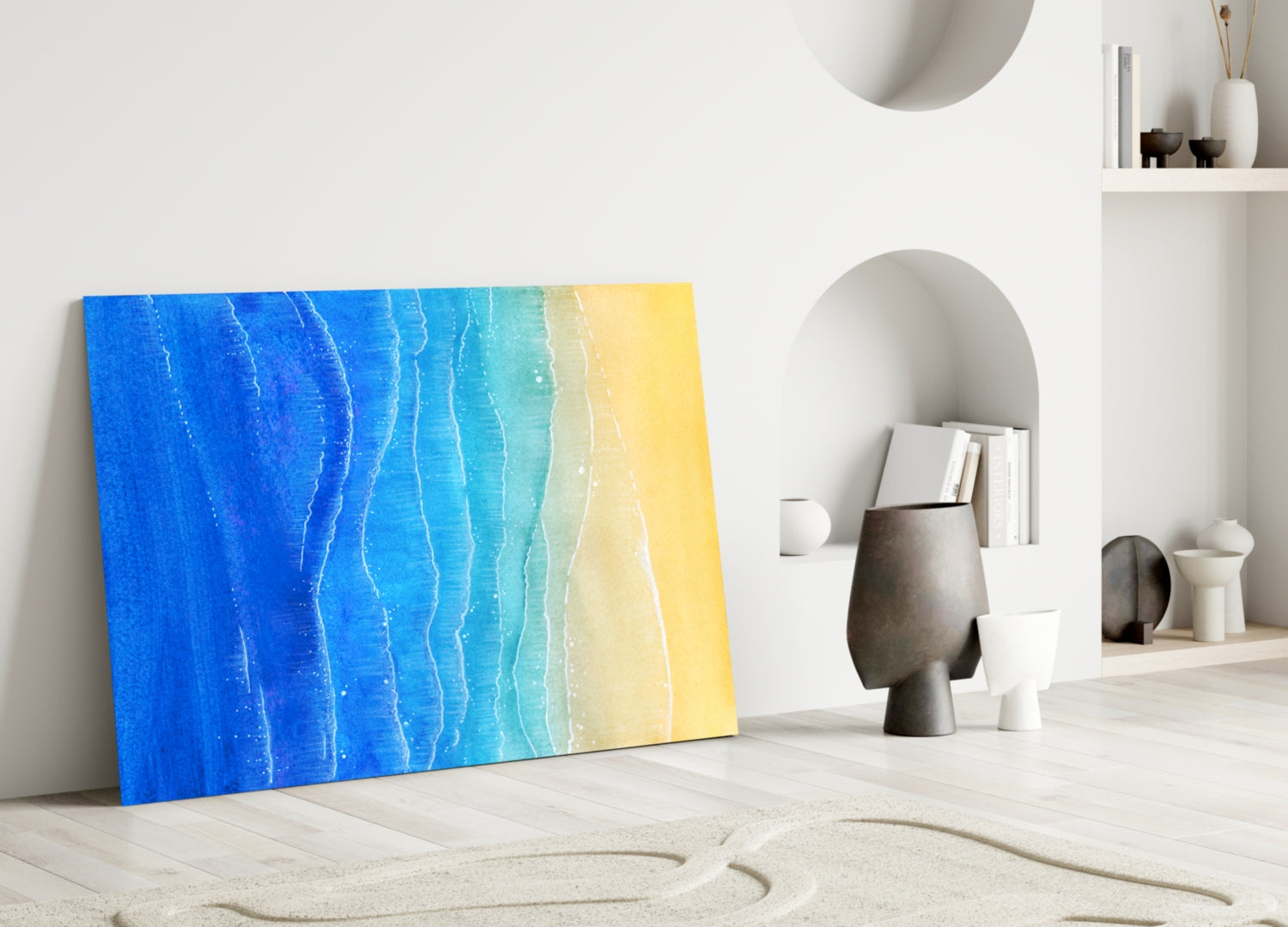 Sea Sand Glass Wall Art leaning against white wall displaying blue-to-yellow gradient waves texture in minimalist interior setting.
