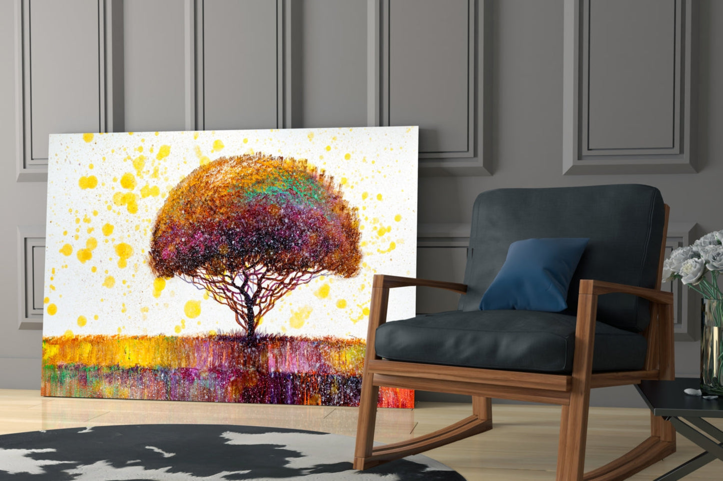 Colorful tree glass wall art displayed in a modern living room next to a wooden rocking chair with blue cushion.