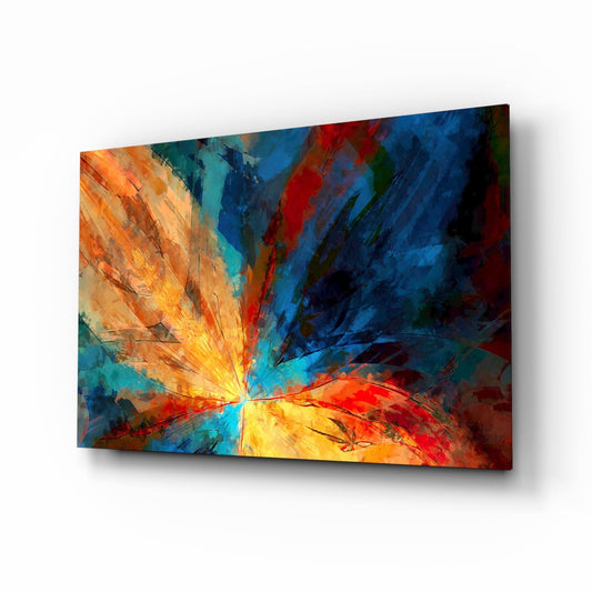 Angled perspective of colorful glass wall art featuring radiant yellow center with blue, orange, and red streaking brushstrokes.