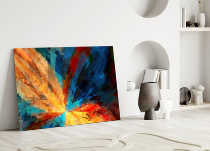 Vibrant fractal flower glass art leaning against white wall in minimalist room with shelving and decorative objects.