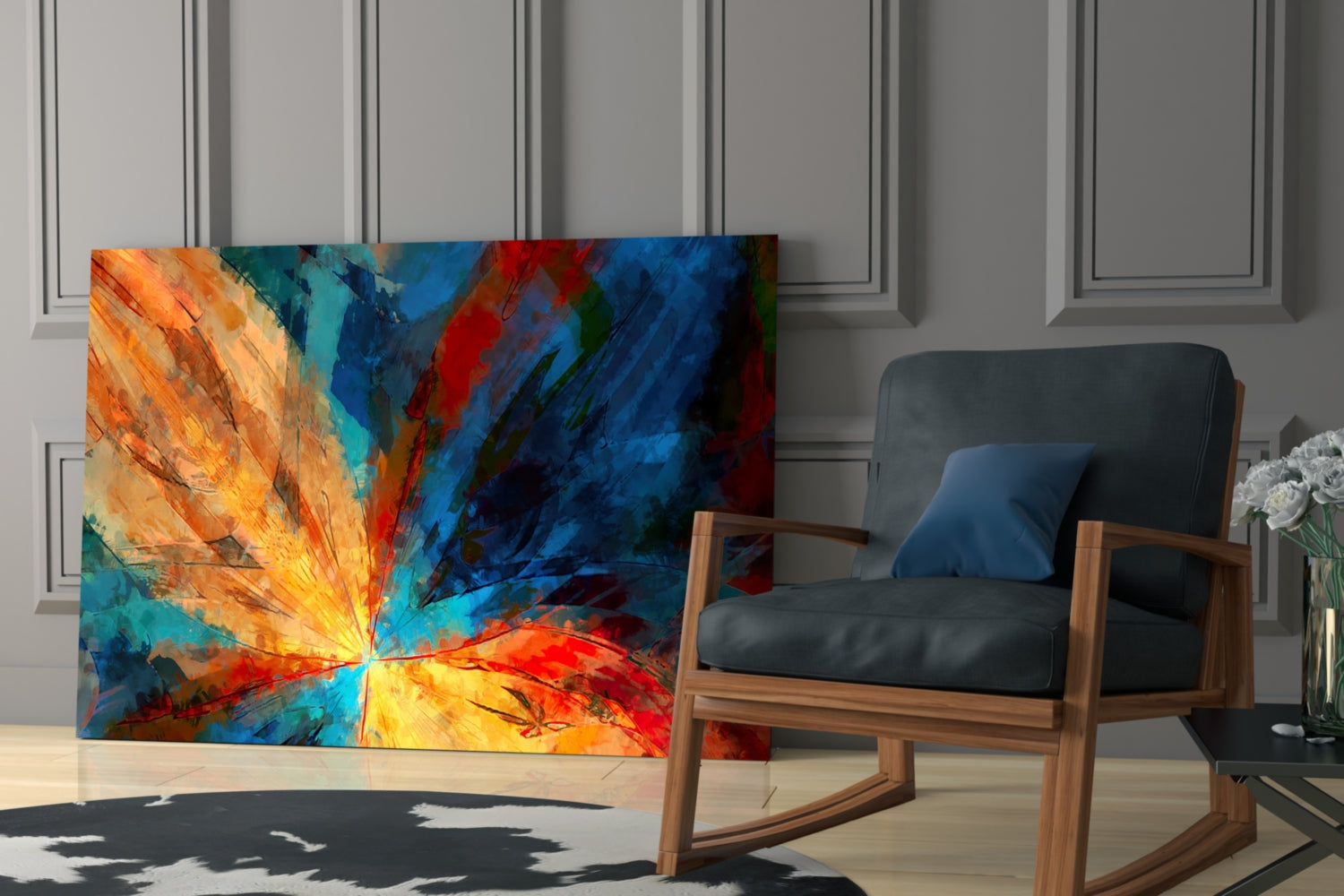 Colorful abstract fractal flower glass art displayed leaning against wall beside wooden mid-century chair in modern interior.