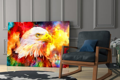 Colorful eagle glass wall art displayed in a modern living room with a wooden rocking chair and paneled walls.