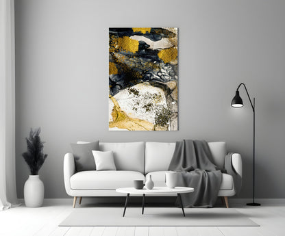 Yellow and white glass wall art with lichen-inspired design displayed above a white sofa in modern living room.