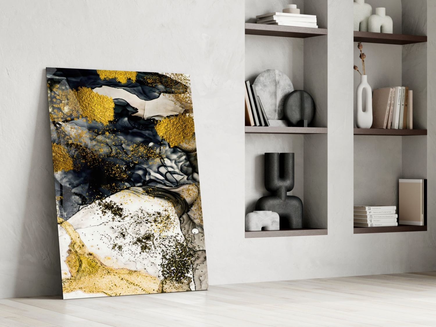 Dance of Yellow Glass Wall Art leaning against white wall beside shelving unit displaying books and decorative objects.
