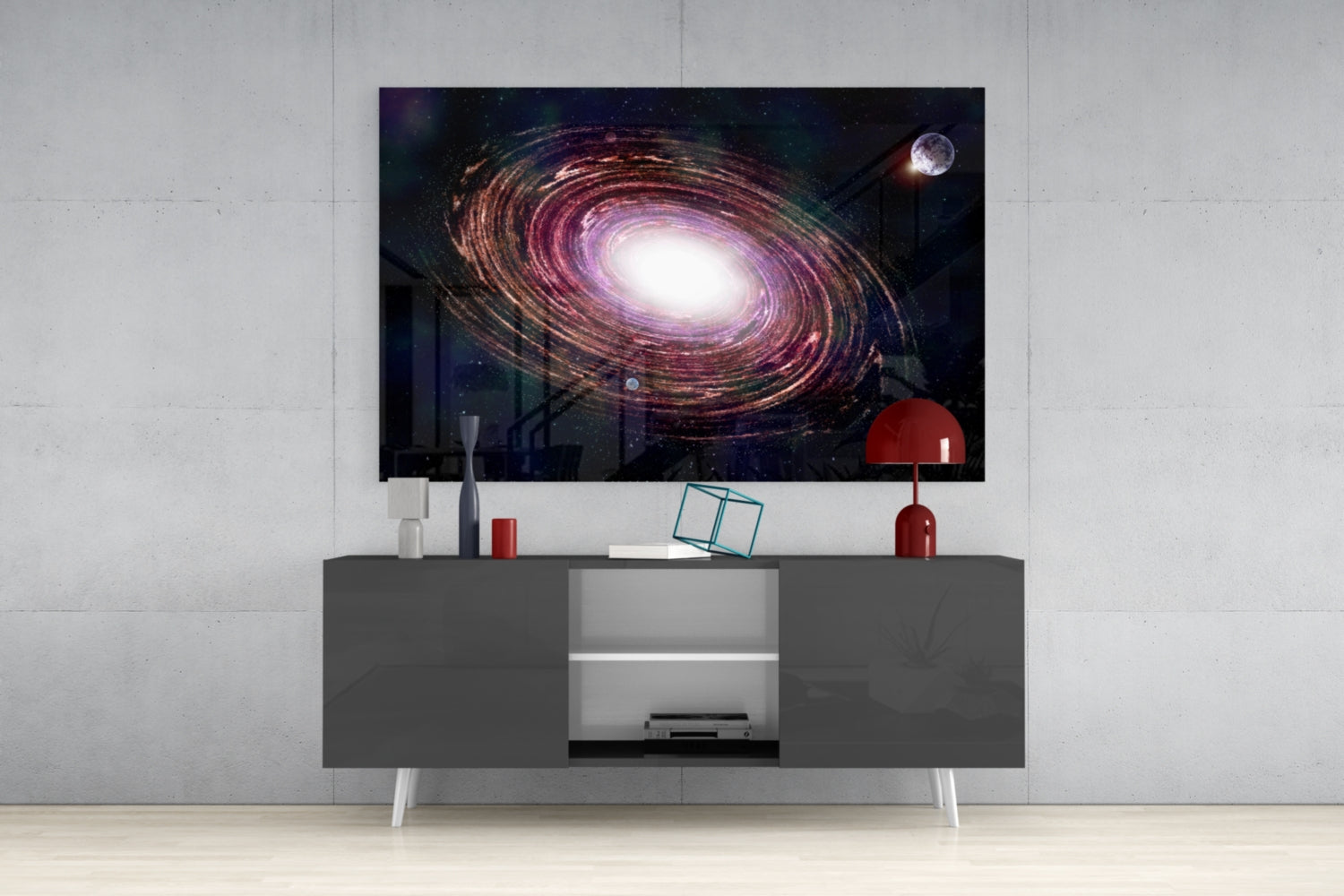 Milky Way Glass Wall Art displaying a spiral galaxy with purple and gold tones mounted above a gray media console in a modern interior.