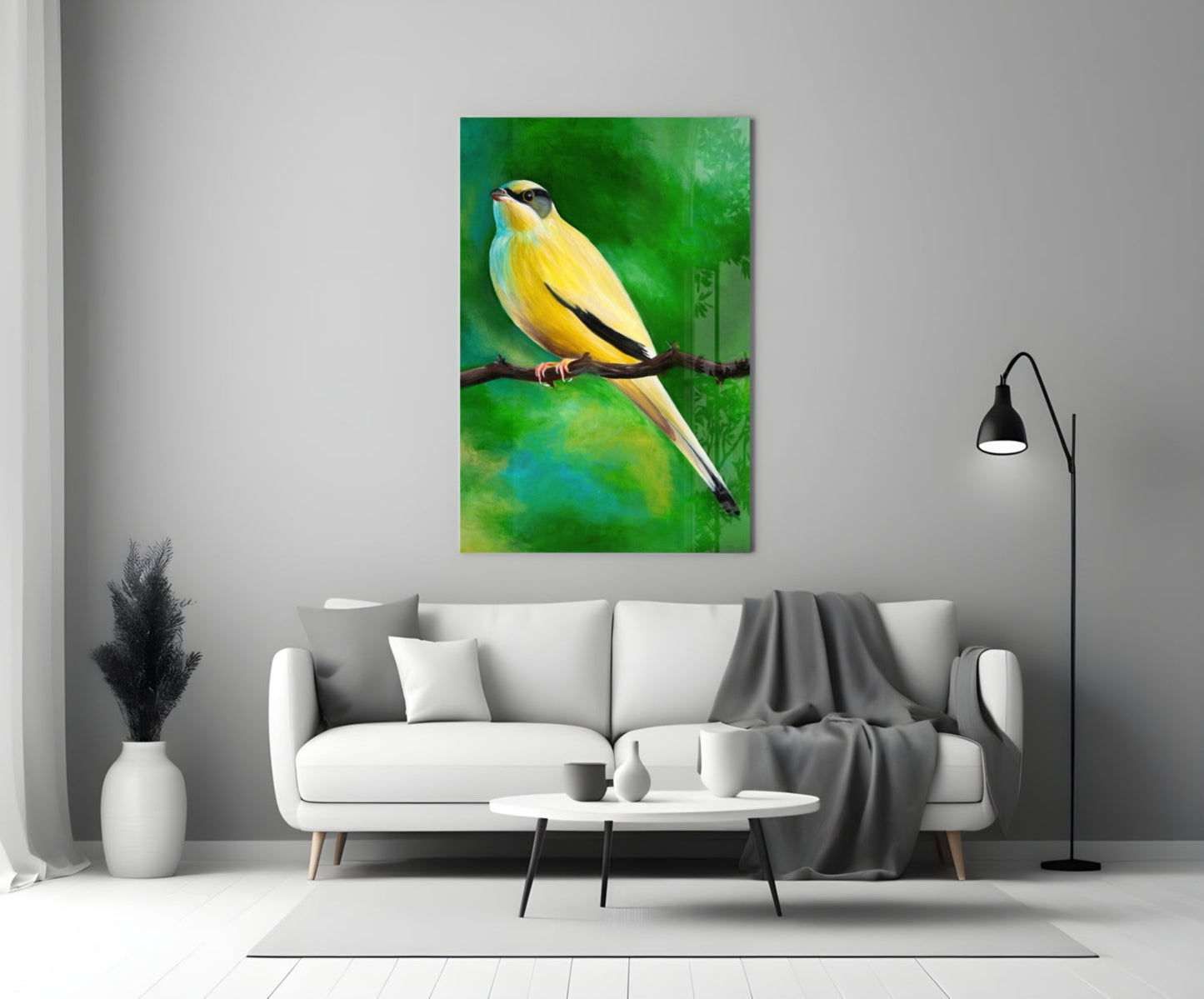 Yellow and black bird on brown branch against green gradient background, displayed on white living room wall above sofa.