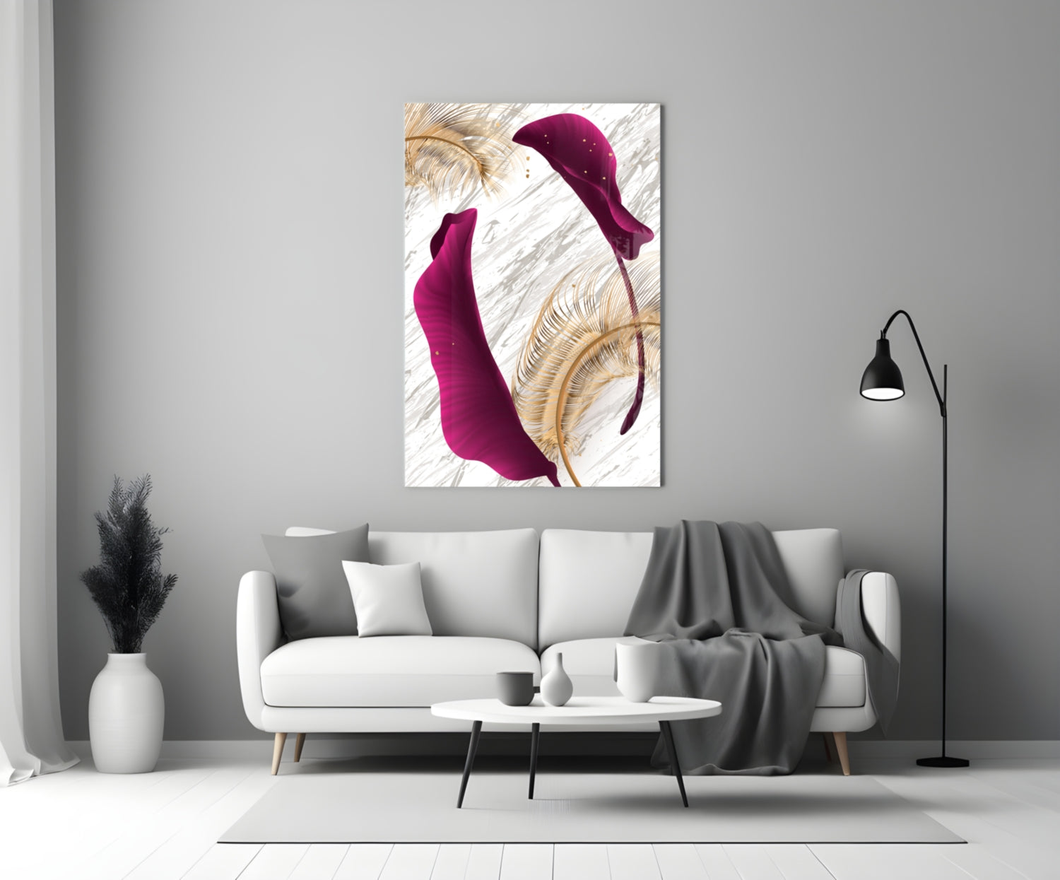 Modern living room with white sofa displaying burgundy and gold leaf glass wall art above it.