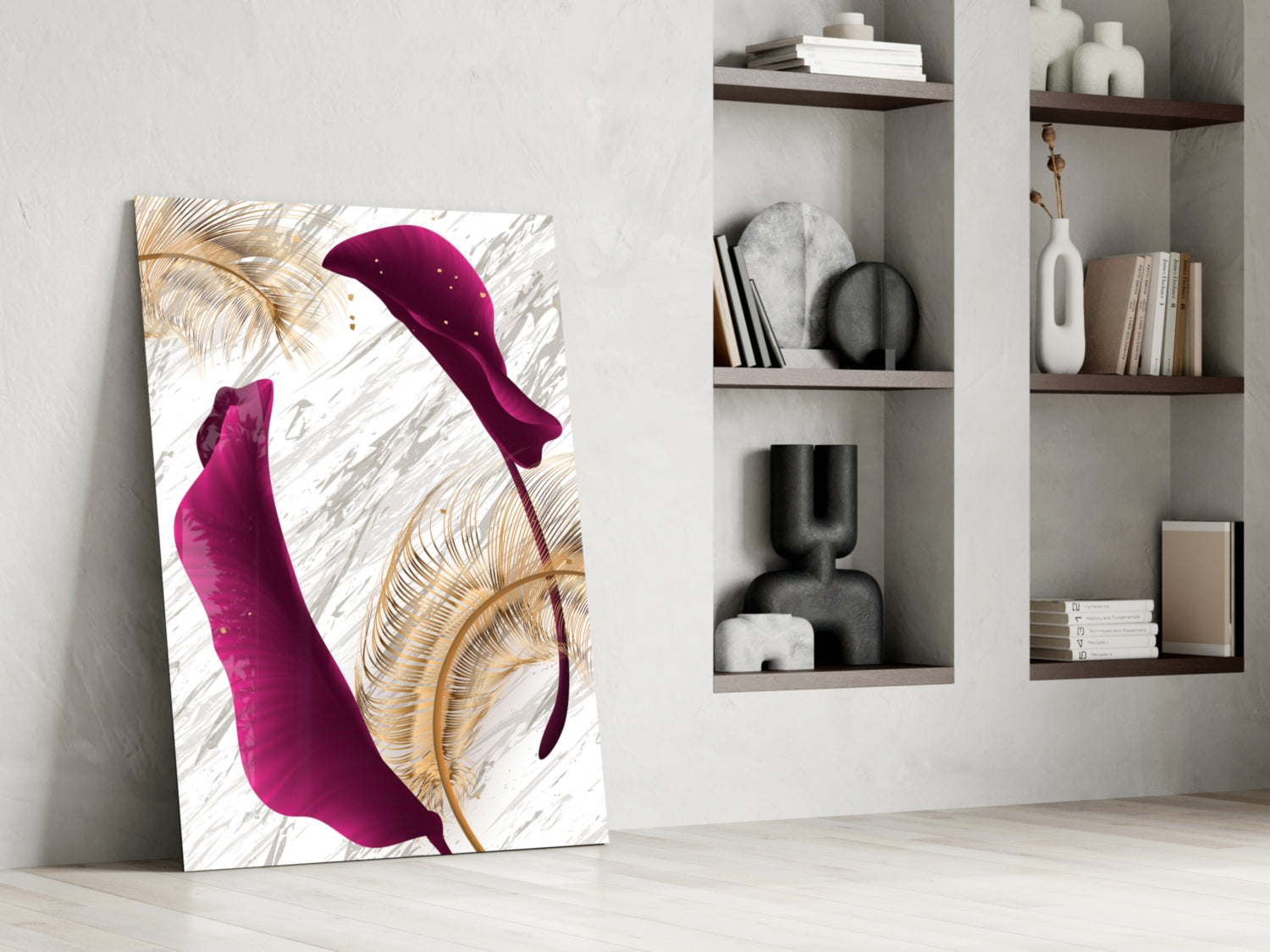 Burgundy Leaves Glass Wall Art leaning against white wall next to built-in shelving displaying decorative objects and books.