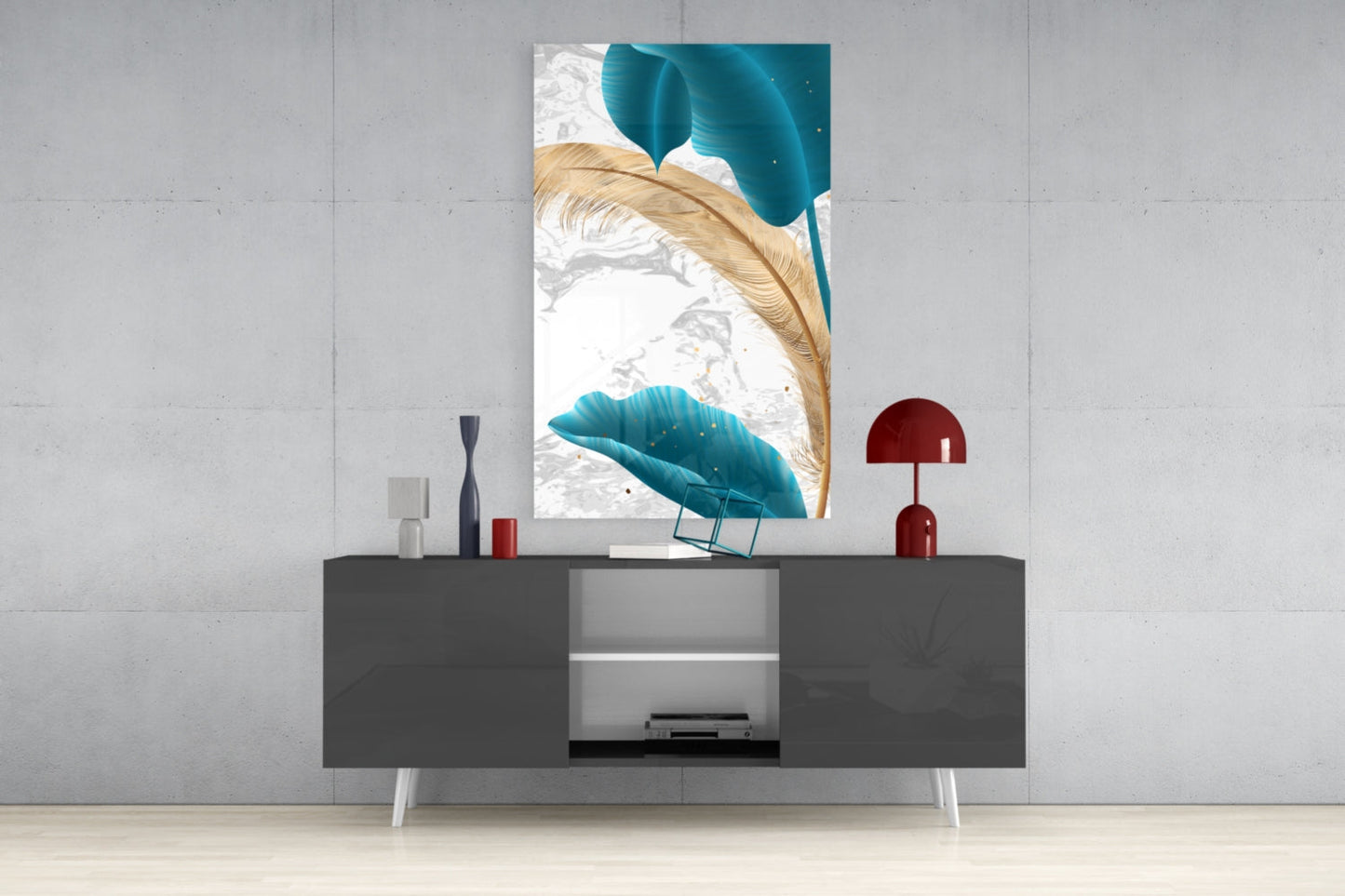 Turquoise and gold leaf glass wall art displayed above a gray media console in a modern interior setting.