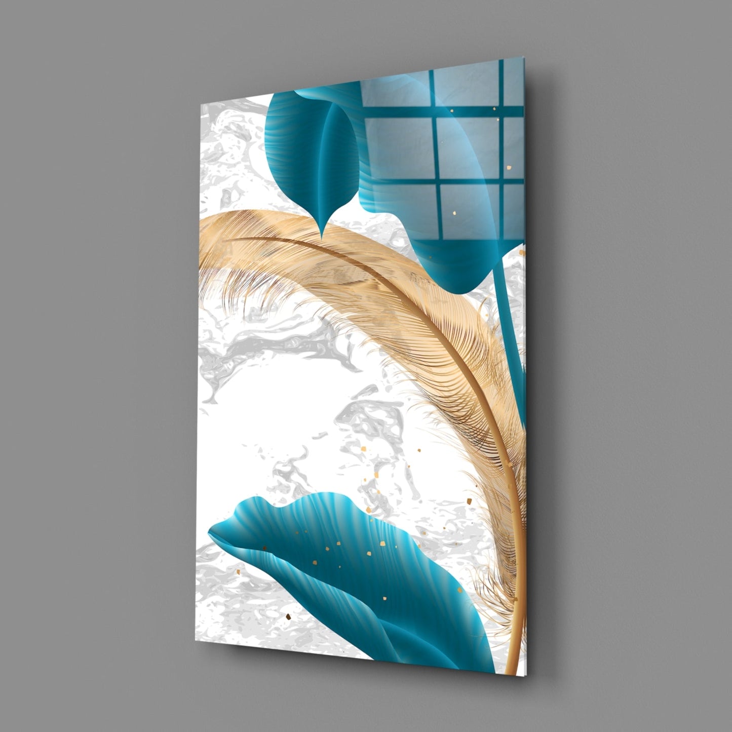 Angled perspective of turquoise glass wall art featuring stylized teal leaves and golden feather against white marble texture background.