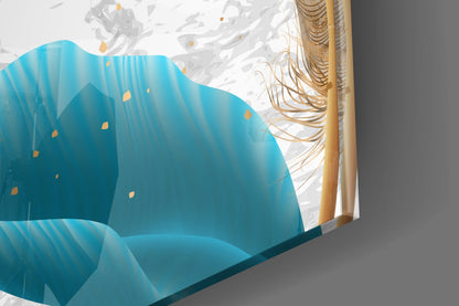 Close-up side angle of turquoise glass wall art with layered blue leaf design and gold accents against white background.