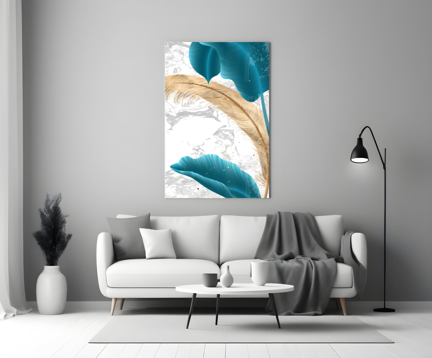 Turquoise Leaves Glass Wall Art displayed above a white sofa in a minimalist living room setting.