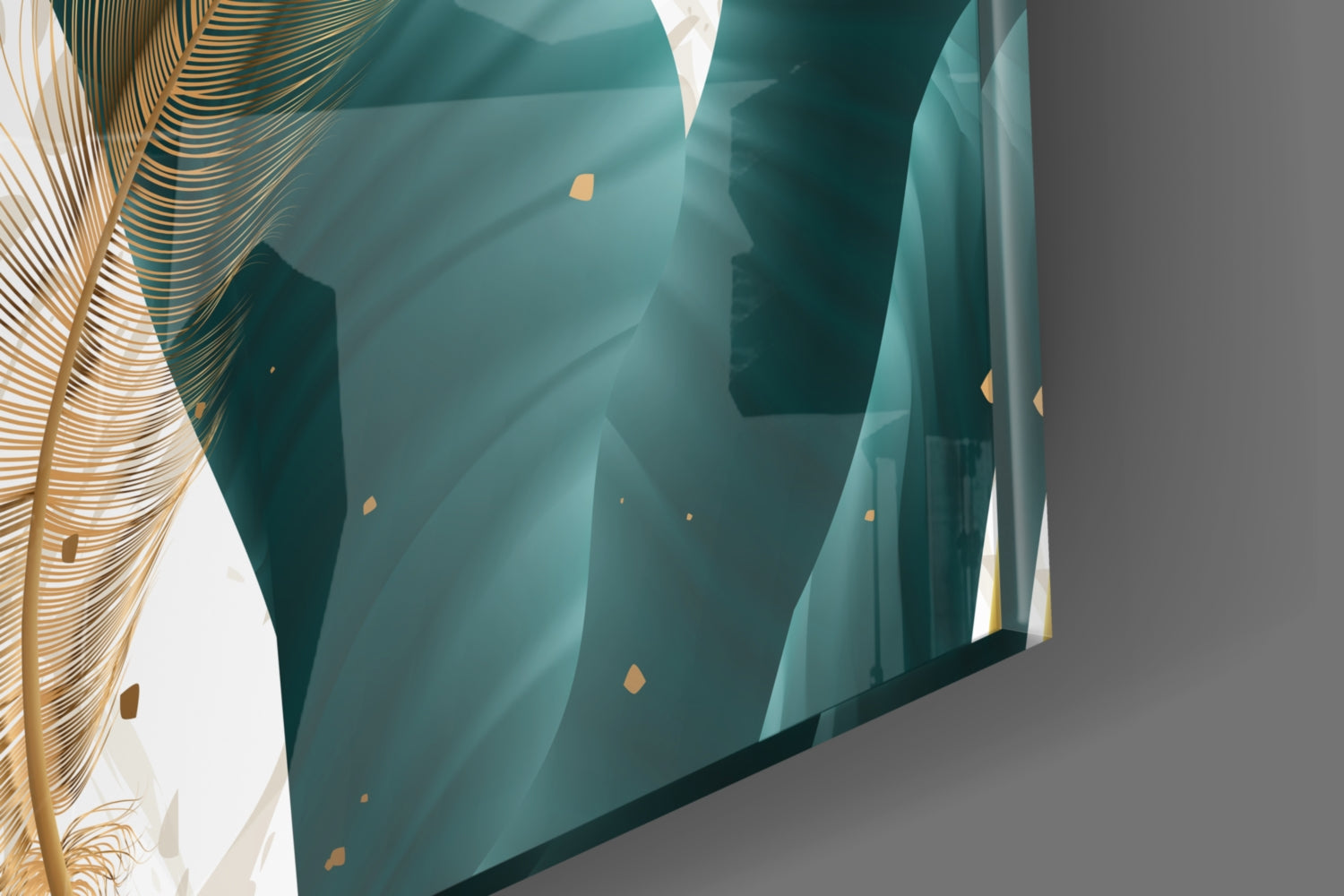 Angled view of teal glass wall art with geometric leaf patterns and gold accents, mounted on gray wall with decorative gold foliage visible on left.