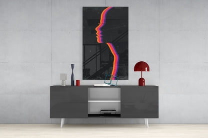 Modern living room display featuring Night Filter Glass Wall Art with vibrant rainbow-colored wavy lines mounted above a dark console table with red and white accessories.