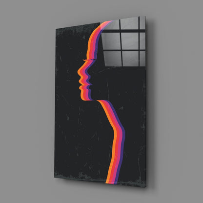 Black glass wall art panel with colorful neon-striped profile silhouette and grid window overlay, angled three-quarter view.