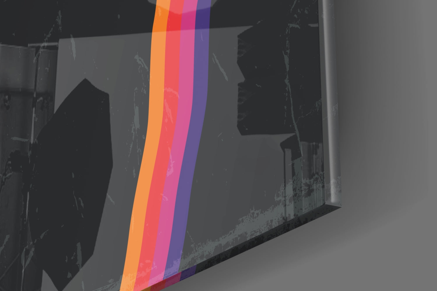 Angled perspective view of Night Filter Glass Wall Art displaying vertical stripes in orange, red, pink, and purple over grayscale architectural imagery.