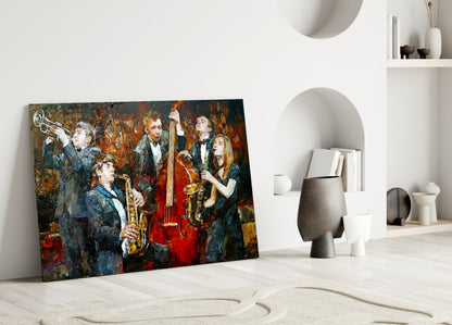 Glass wall art depicting musicians in formal attire playing saxophones and trumpet against dark, textured background with warm gold and red tones, leaning against white interior wall.