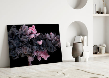 Pink Smoke Glass Wall Art leaning against white wall in minimalist interior with neutral décor and sand pattern floor.