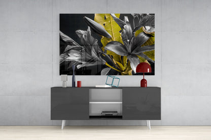 Gold Leaf Lilies wall art displayed on gray TV console with red lamp and decorative accessories against white wall.