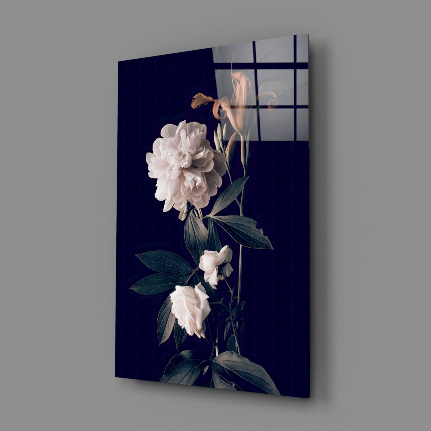 Angled view of white peonies with green stems on dark navy background glass panel with window grid overlay.