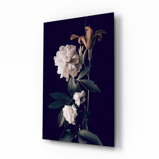 Angled view of glass wall art featuring white peonies and dried stems against dark navy background.