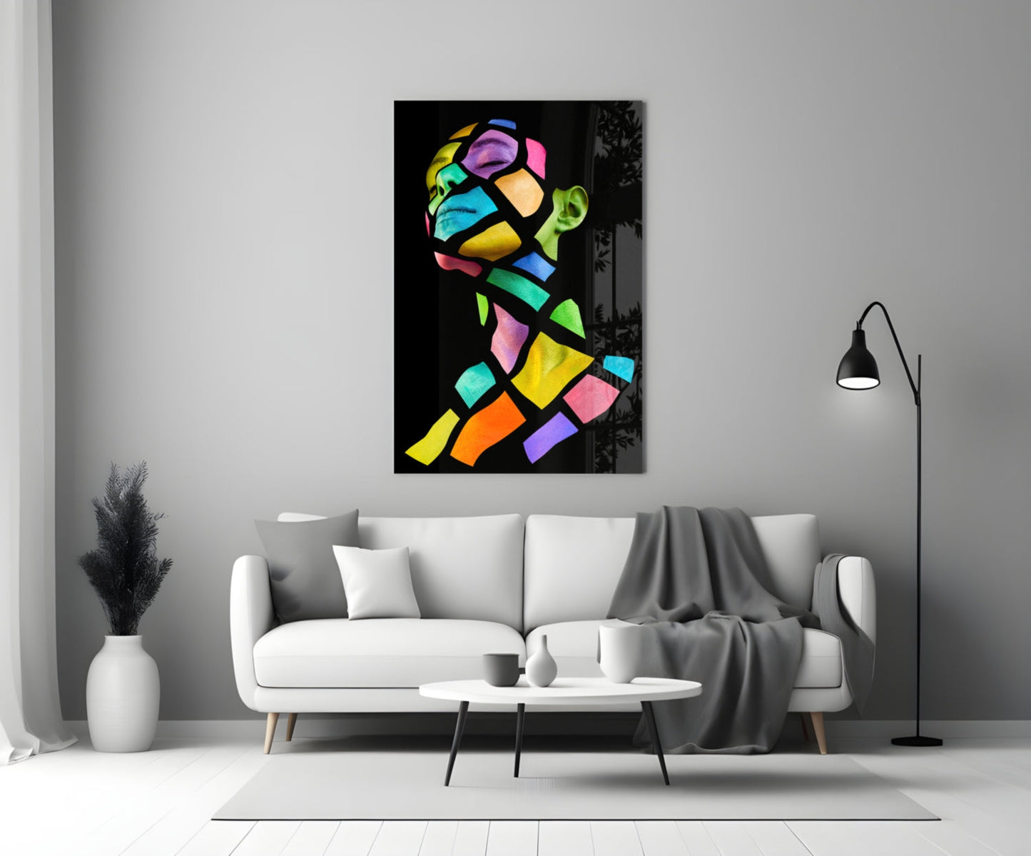 Colorful Spirit Glass Wall Art displayed above white sofa in minimalist living room with black floor lamp and white vase.
