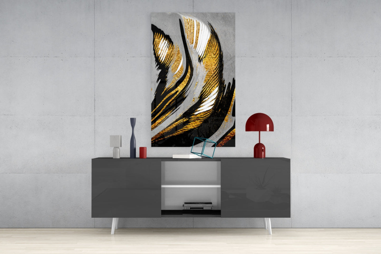 Golden Wings glass wall art with black, gold, and white striped feather design displayed above gray media console in modern interior setting.