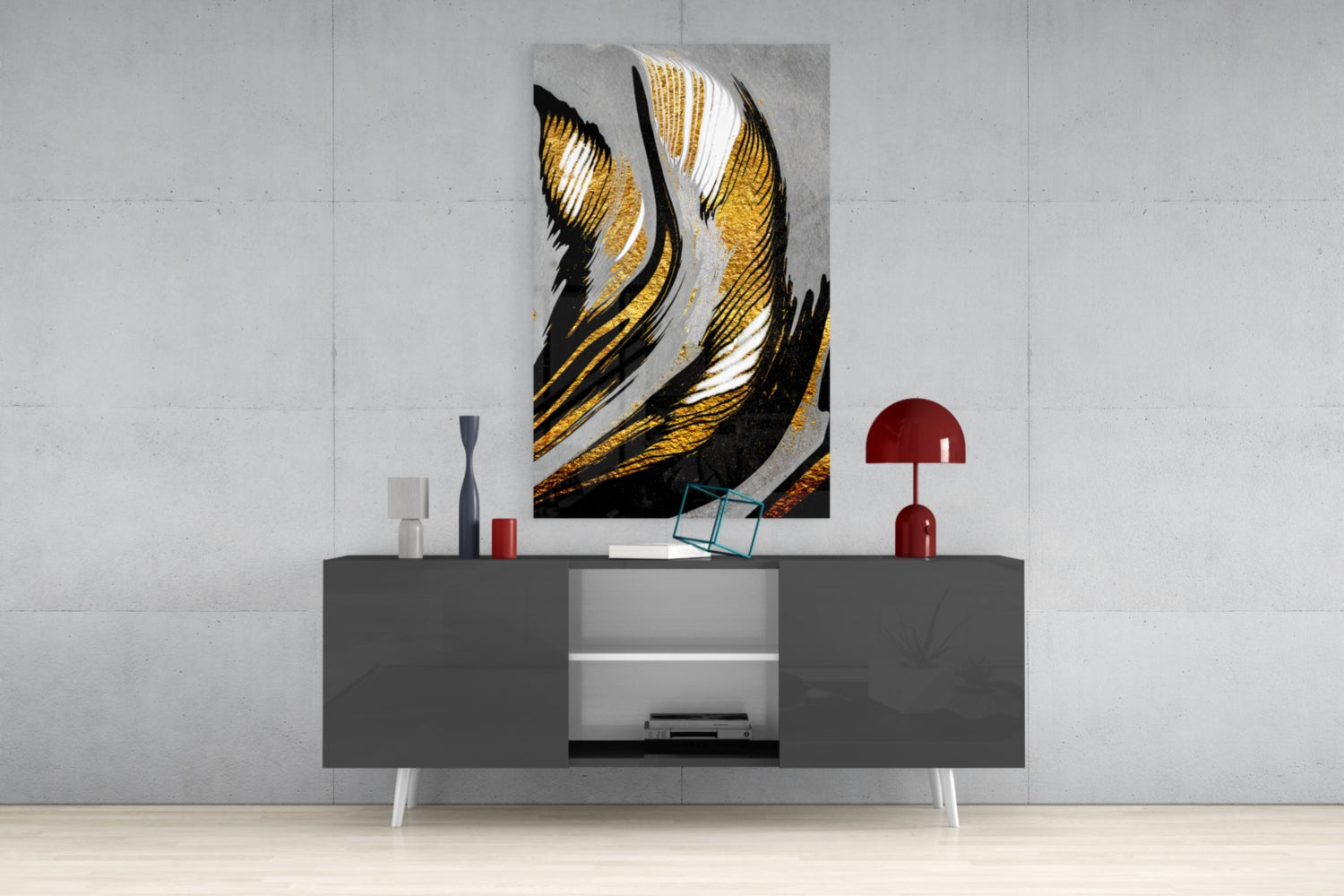 Golden Wings glass wall art with black, gold, and white striped feather design displayed above gray media console in modern interior setting.