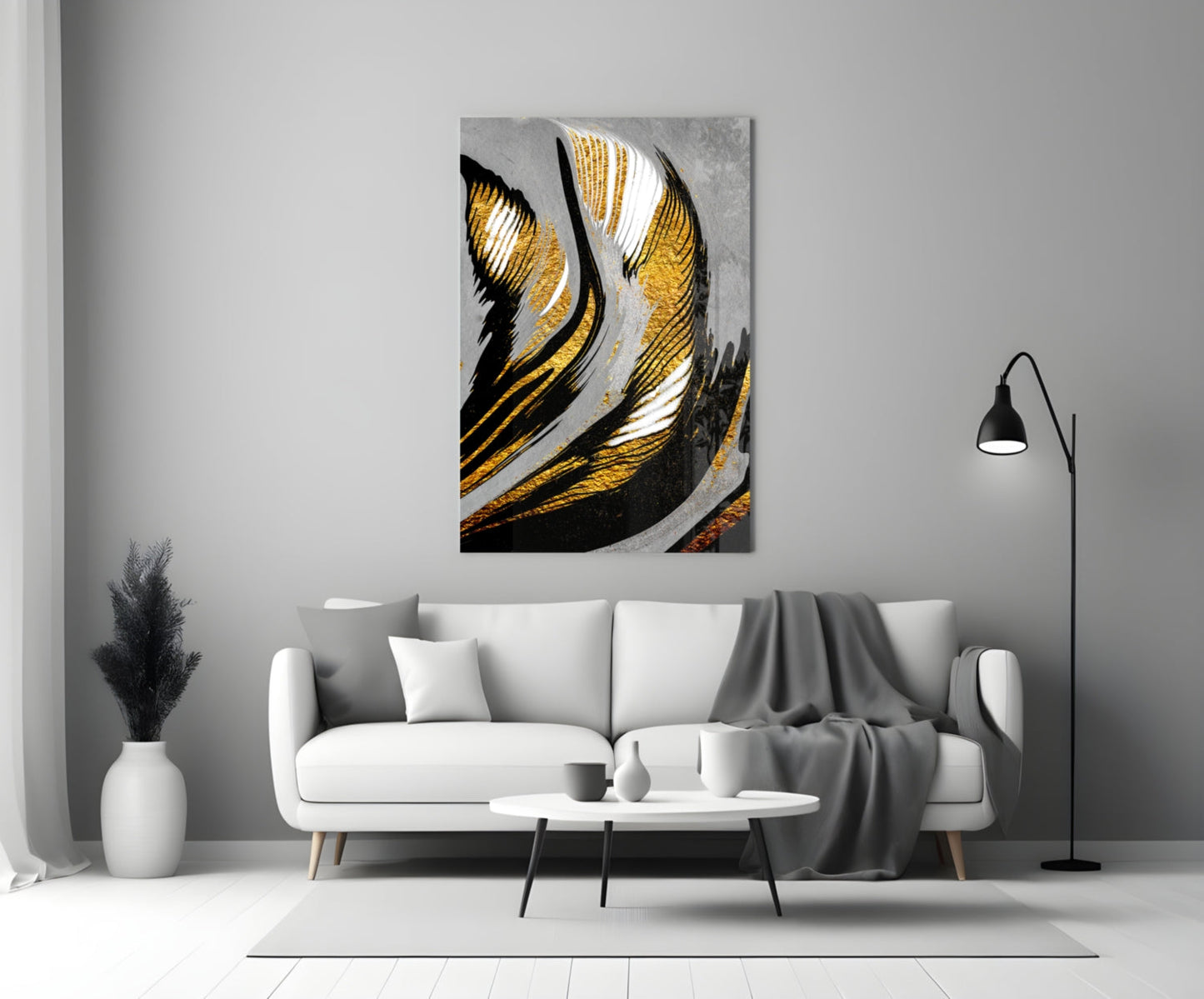 Golden Wings Glass Wall Art featuring black, gold, and white striped abstract design displayed above white sofa in modern living room.