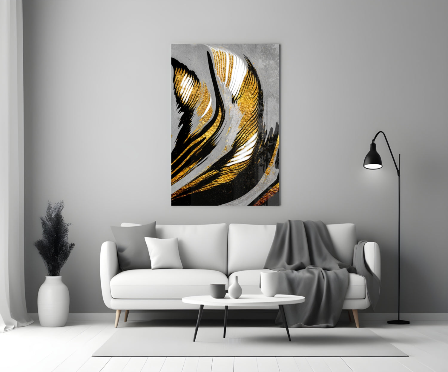 Golden Wings Glass Wall Art featuring black, gold, and white striped abstract design displayed above white sofa in modern living room.