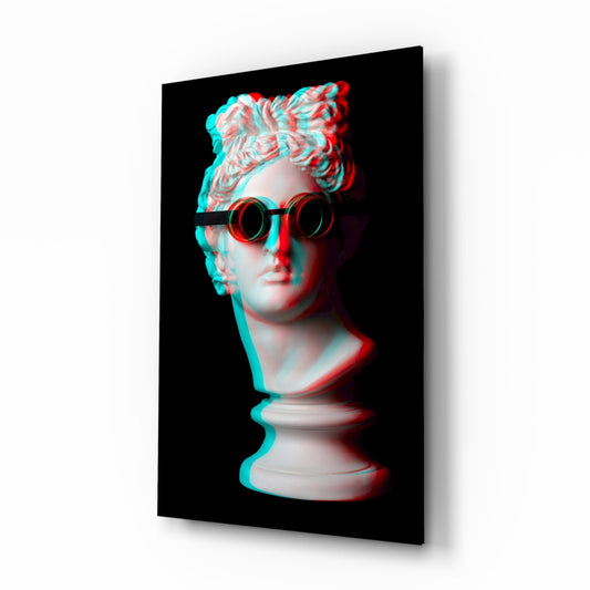 Classical white bust wearing round red-framed goggles with cyan and red chromatic aberration effect on black background, displayed at three-quarter angle.