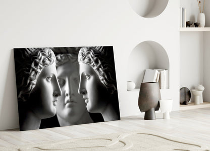 Black and White Mirrored Statue Faces Glass Wall Art