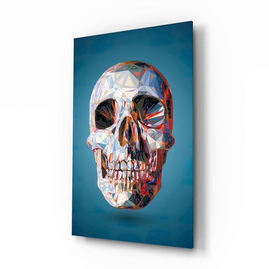 Geometric crystal low poly skull with white, red, and blue facets displayed at an angle against a teal blue background on a mounted panel.