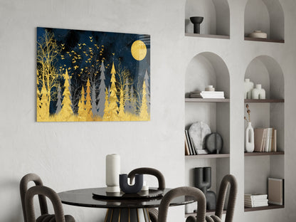 Colors of the Night glass wall art depicting golden trees and full moon against dark blue background, displayed above black dining table with gray chairs.
