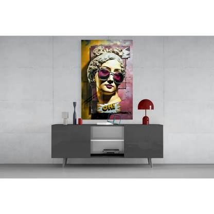 Vibrant pop-art glass wall art of statue head in pink sunglasses and purple lipstick with comic oh bubble