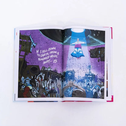 Open Oliver Tree Alien Boys Graphic Novel with vibrant illustrations on Orpheus Collar