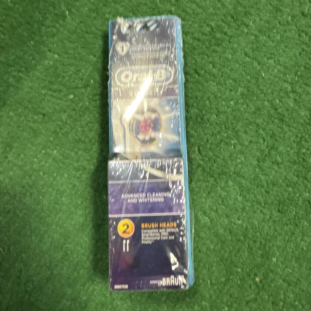 Oral-B electric toothbrush heads pack of 2 in blue white purple packaging