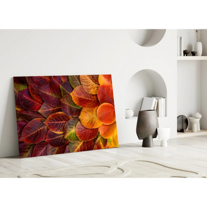 Stunning autumn leaves glass wall art print in vibrant reds oranges purples