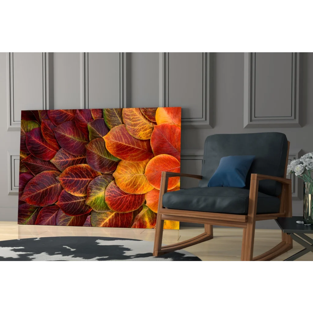 Vibrant autumn leaves glass wall art in rich reds, oranges, yellows