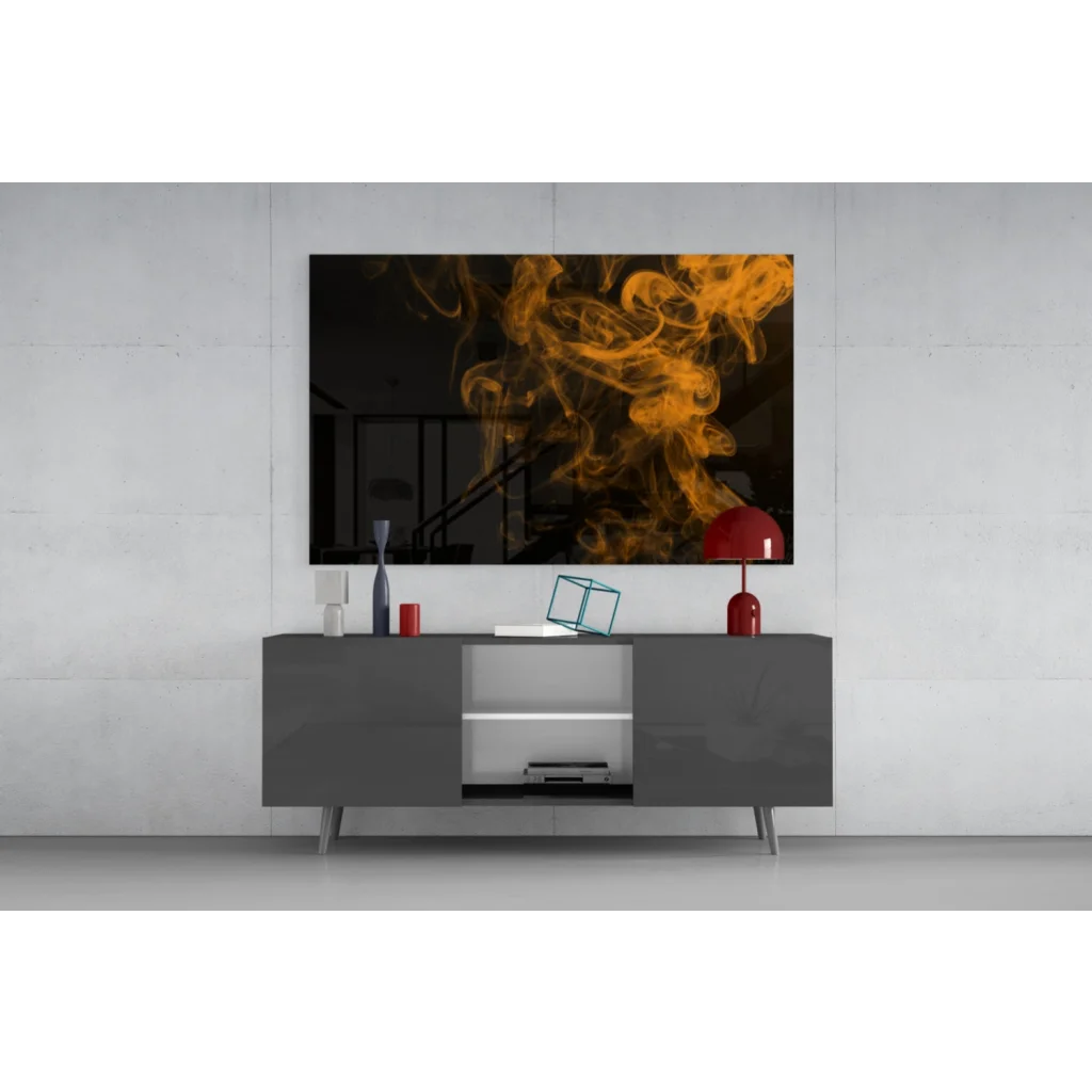 Modern black-and-orange smoke wall art on gray console