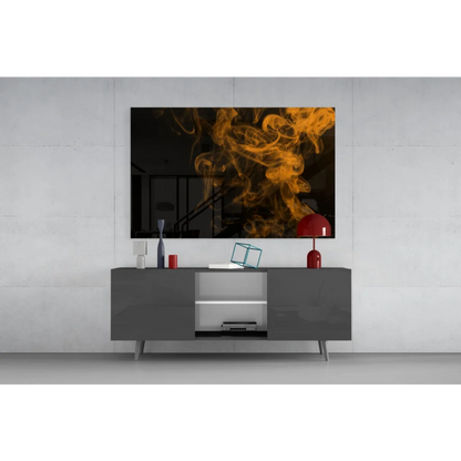 Modern black-and-orange smoke wall art on gray console
