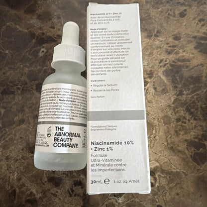 The Ordinary Niacinamide 10% + Zinc 1% oil control serum in white glass dropper bottle